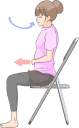椅子に座って腹式呼吸で息を吸うストレッチをする女性のイラストです。