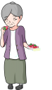 苺を食べる老人女性
