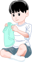 服をたたむ男の子