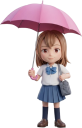 傘をさす女子生徒